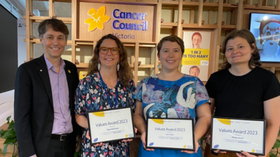 Values Award winners Megan Blackmore, Clare Tyson and Pheobe Moody with Cancer Council Victoria Todd Harper